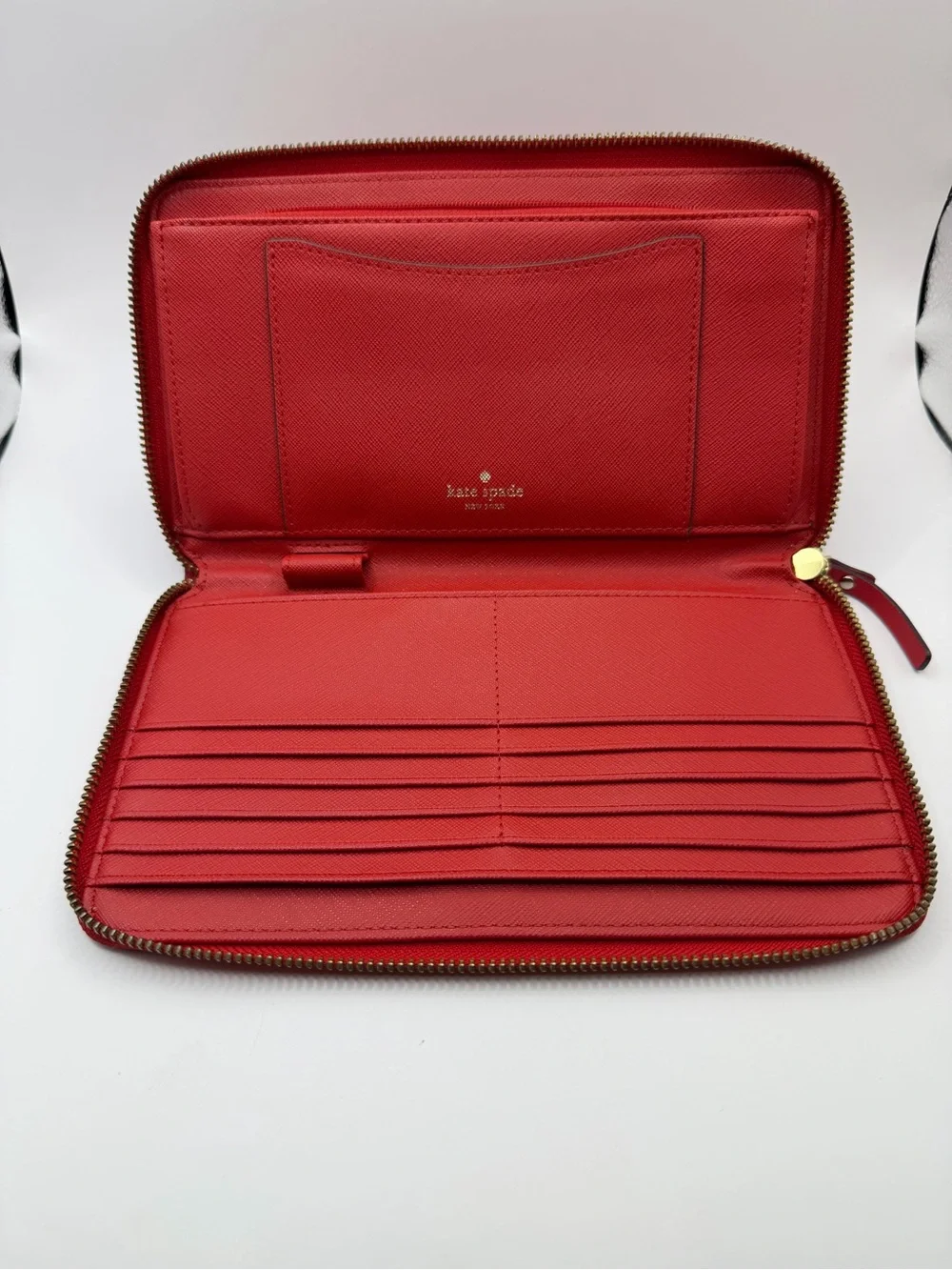 Kate Spade New York red Saffiano leather extra large zipper round wallet